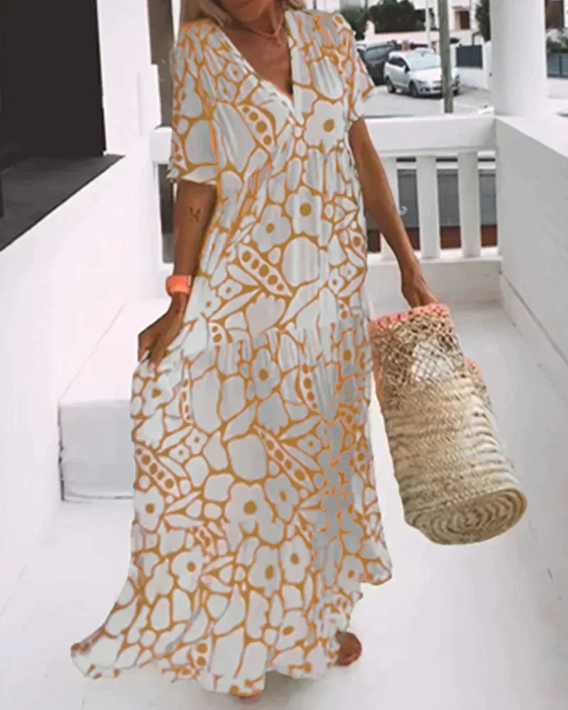 Cristina | Vestido largo de verano con corte fluido y elegante estampado gráfico