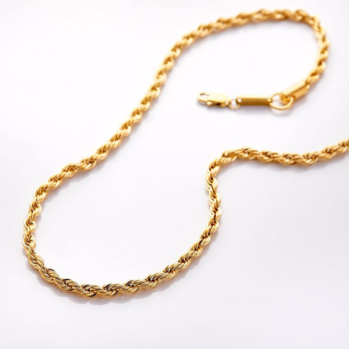 Helena – Collar dorado con decoración punteada.