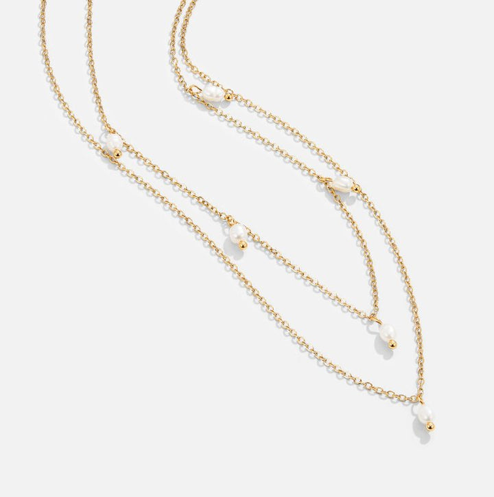 Tanja – Collar dorado de capas con artículo moderno.