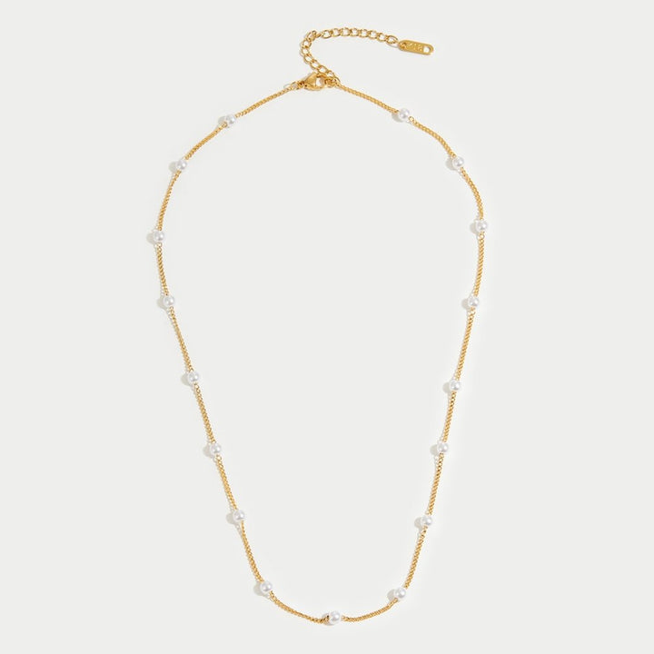 Miriam – Collar dorado con una longitud armónica.